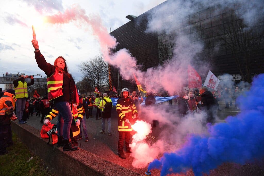 A protest on Friday blocked the traffic on the périphérique, the highway that circles Paris.Credit...Bertrand Guay/Agence France-Presse — Getty Images