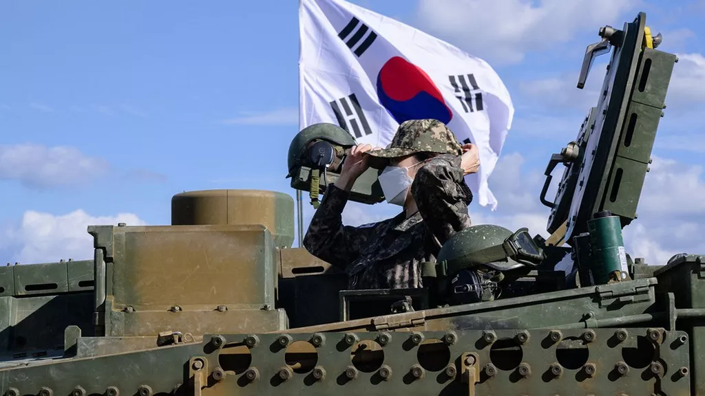 Une femme soldat de l'armée sud-coréenne lors d'un exercice. ((Photo Anthony WALLACE/AFP)