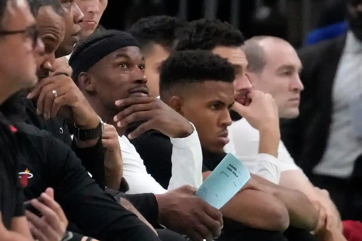 Heat forward Jimmy Butler watches from the bench during the second half of Thursday’s game at TD Garden in Boston. Photograph: Charles Krupa/AP