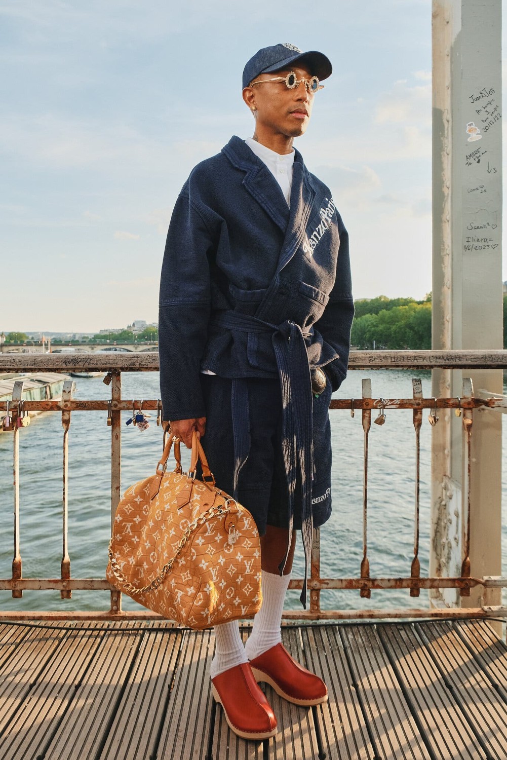 Pharrell Williams received a lot of attention in Paris for his first collection as Louis Vuitton’s men’s creative director. But he also deserved recognition for pairing clogs with this kimono-inspired jacket-and-shorts set.