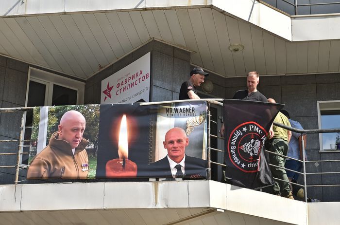 A banner with portraits of Yevgeny Prigozhin and Dmitry Utkin outside the local office of Wagner Group in Novosibirsk, Russia. PHOTO: STRINGER/REU