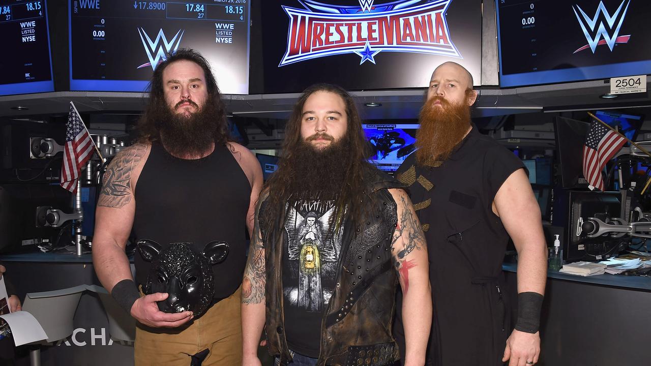 Bray Wyatt (centre) surrounded by Braun Strowman (L) and Erick Rowan (R). (Photo by Gary Gershoff/WireImage)
