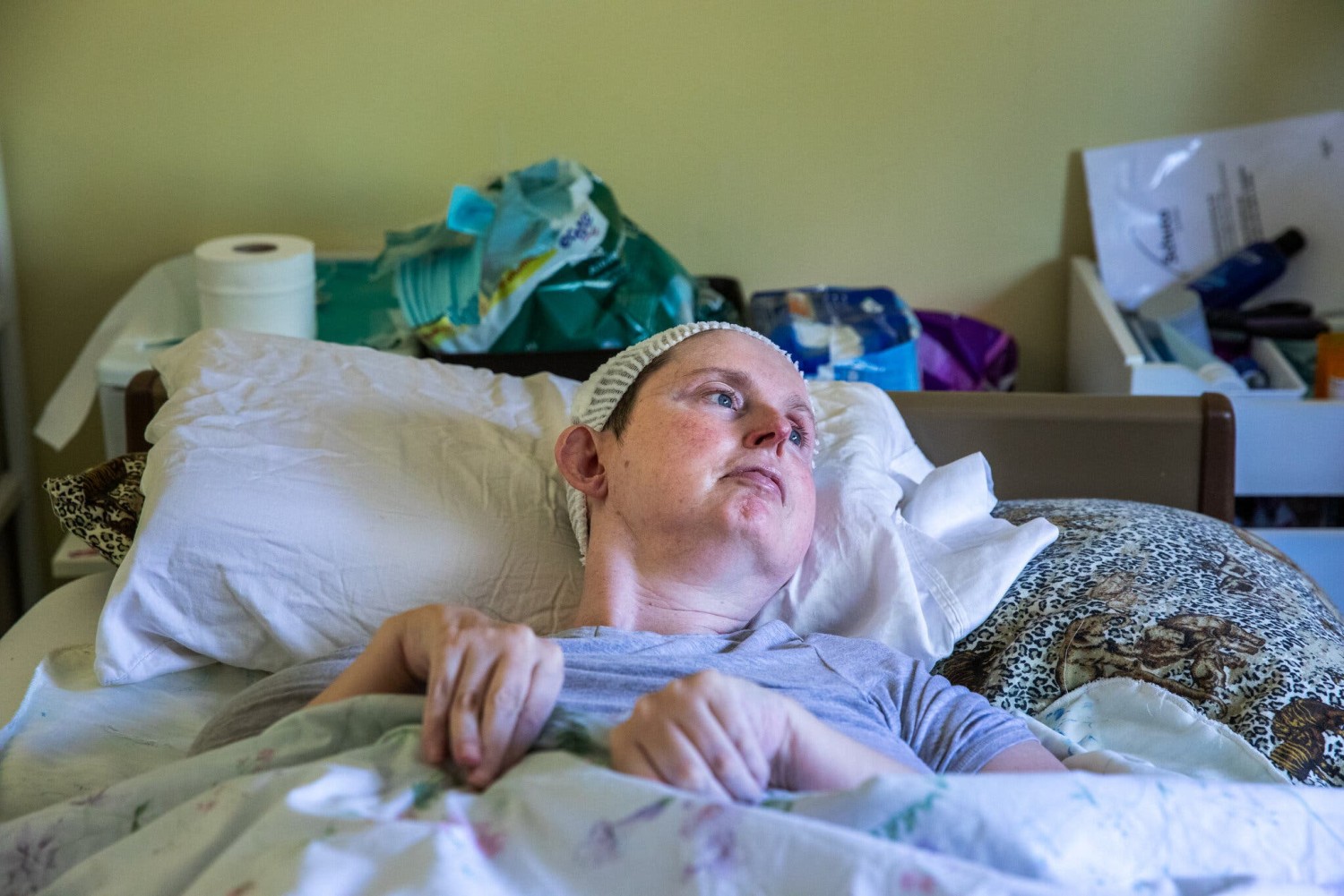 Ann Johnson, a teacher, volleyball coach and mother from Regina, Saskatchewan, had a paralyzing stroke in 2005 that took away her ability to speak.Credit...Sara Hylton for The New York Times
