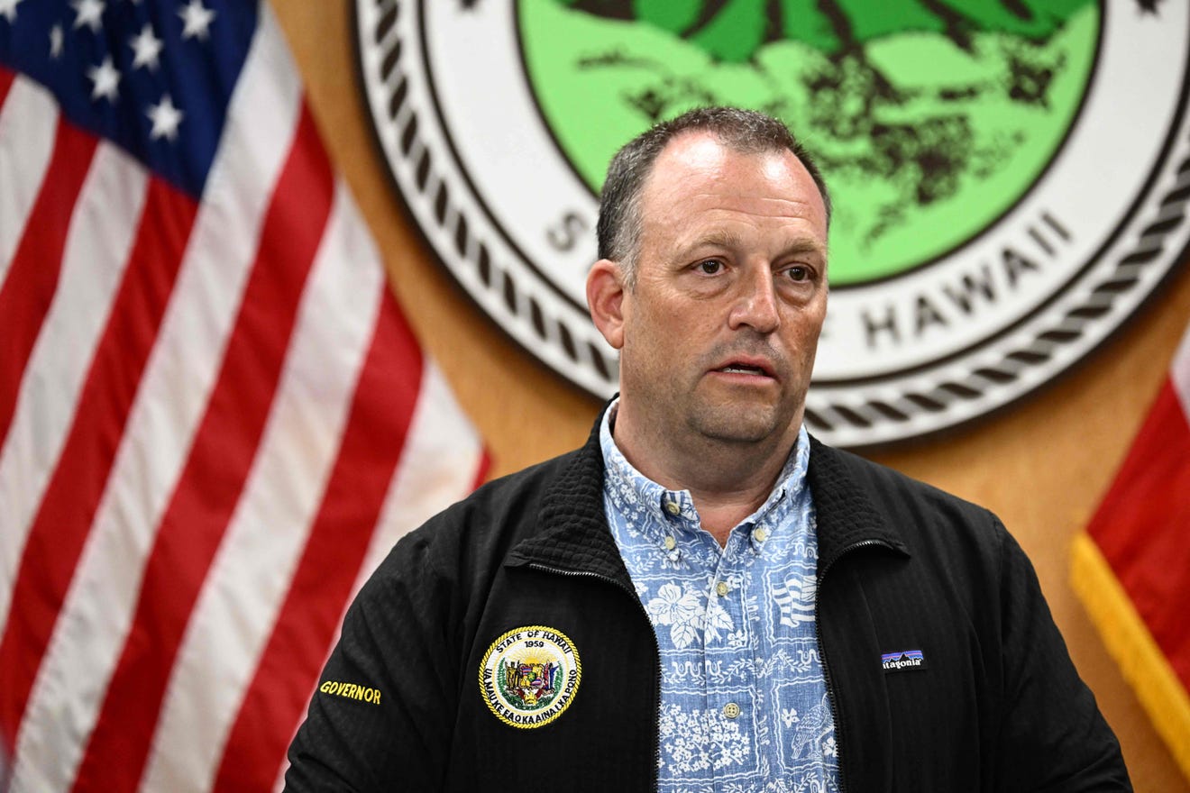 Hawaii Gov. Josh Green speaks during a press conference about the destruction of historic Lahaina and the aftermath of wildfires on Aug. 10, 2023." PHOTO CREDITS: PATRICK T. FALLON, AFP Via Getty Images