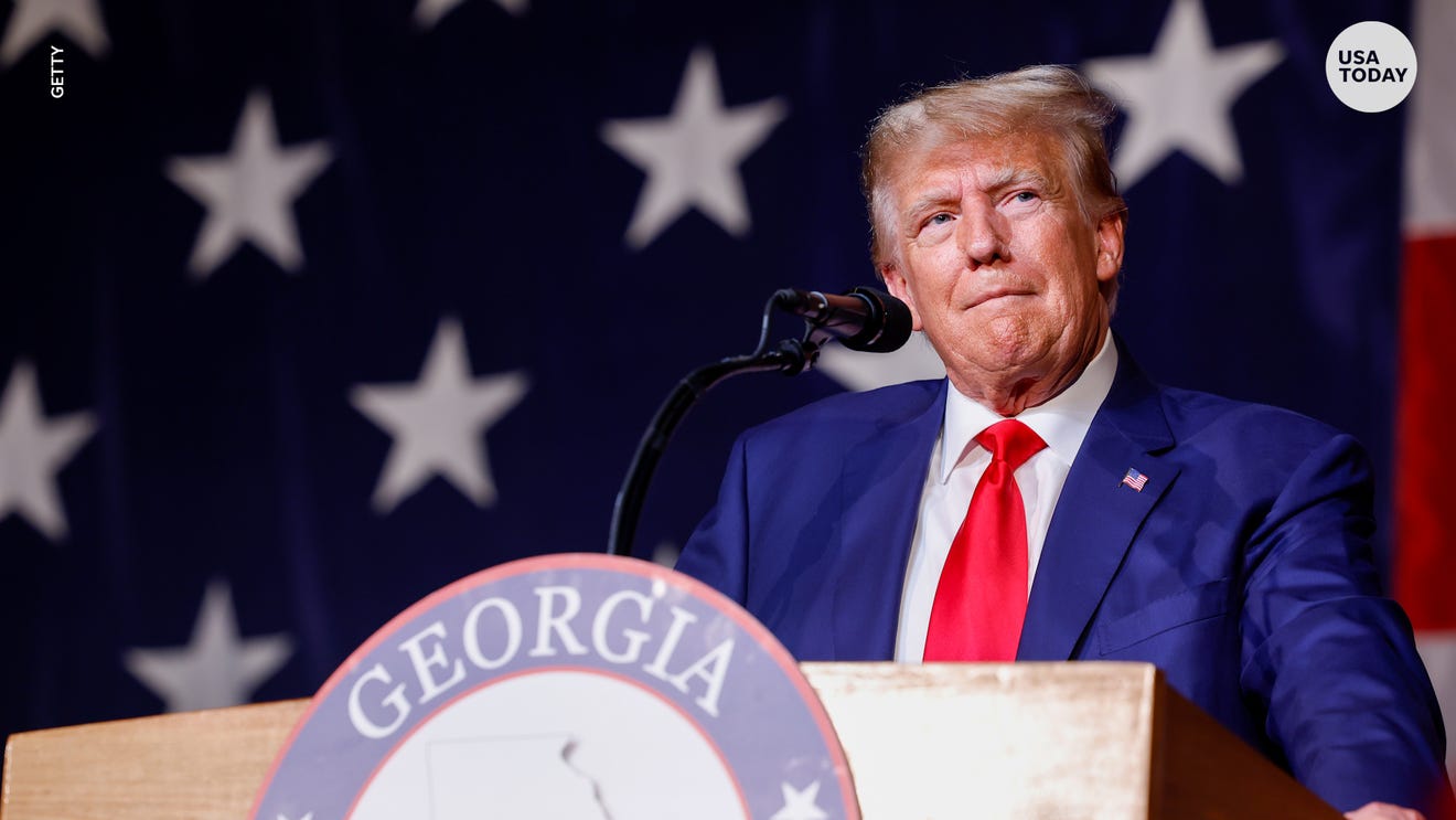 Former President Donald Trump, 18 others charged in Georgia election probe / Getty