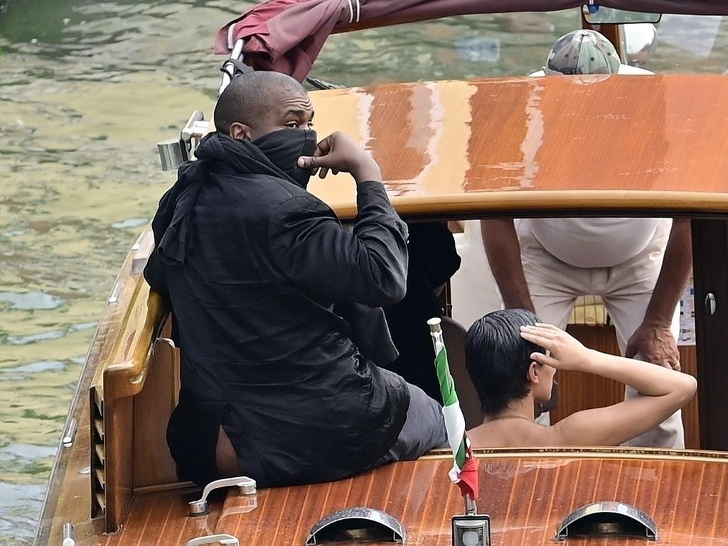 Kanye West and his wife Bianca Censori sparked criticism following this boat ride in Venice on August 28. Picture: Backgrid