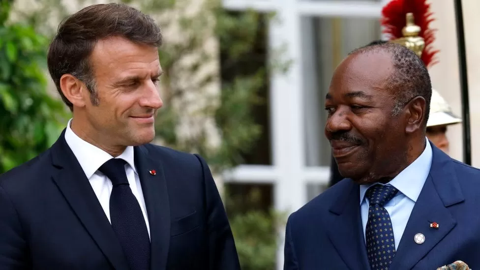 GETTY IMAGES | Gabon's ousted president Ali Bongo - seen here with President Macron - has made moves to pull his country out of the Francosphere