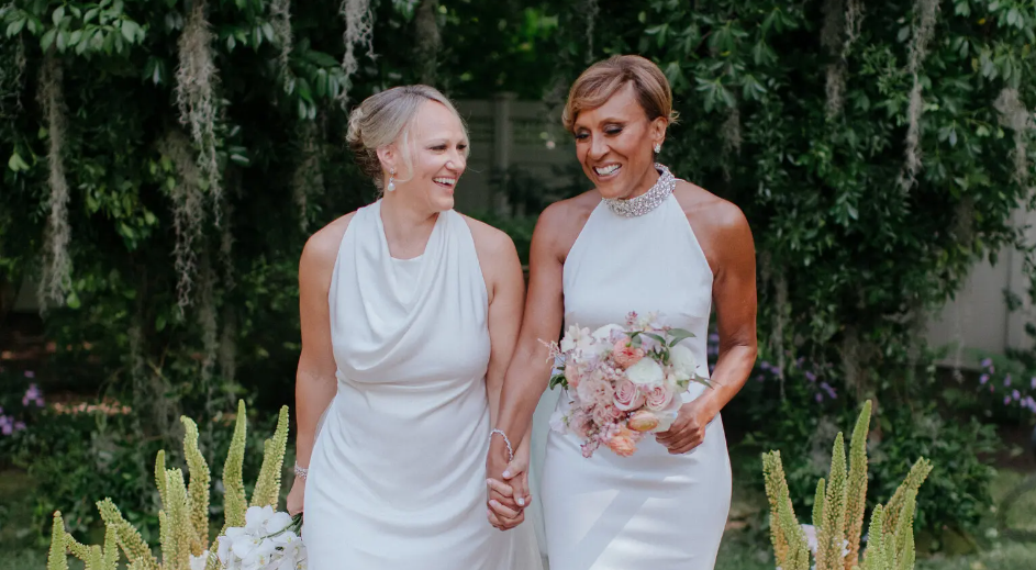 Amber Laign, left, and Robin Roberts, a host of ABC’s “Good Morning America,” were married Sept. 8 in a small ceremony officiated by Ms. Roberts’s childhood pastor, the Rev. Robert Jemerson, at their home in Farmington, Conn.Credit...Chris J. Evans