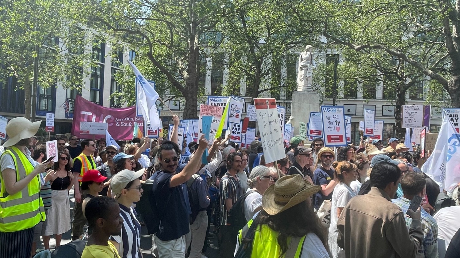A June 2023 show of support for the WGA strike, organized in London by the Writers' Guild of Great Britain (WGGB) on a “Global Day of Solidarity” that used the moniker and hashtag Screenwriters Everywhere. COURTESY OF GEORG SZALAI