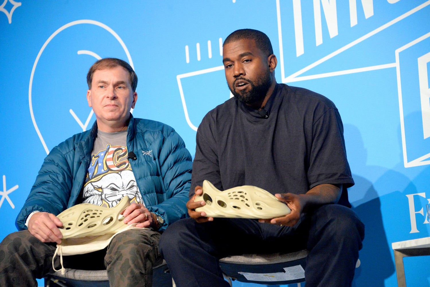 Steven Smith, a shoe designer who has worked on Yeezys for years, in 2019 with Mr. West and the distinctive Foam Runner style.Credit...Brad Barket/Getty Images for Fast Company