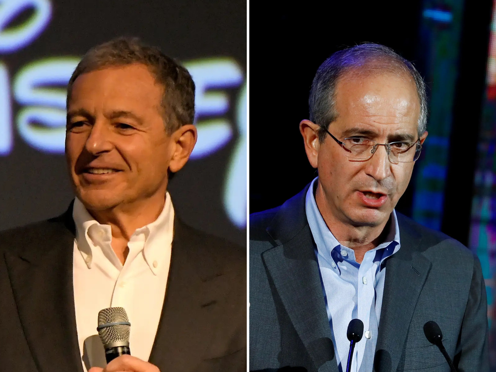 Disney CEO Bob Iger, left, and Comcast CEO Brian Roberts. Charley Gallay/Stringer/Getty; REUTERS