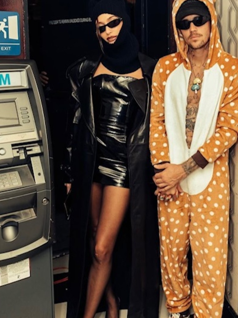 It is not clear idea why they are posing next to an ATM. Picture: Instagram/JustinBeiber