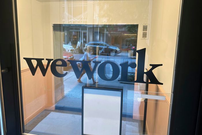 WeWork said Tuesday it entered into a seven-day forbearance agreement with its noteholders after skipping interest payments earlier this month. PHOTO: TED SHAFFREY/ASSOCIATED PRESS