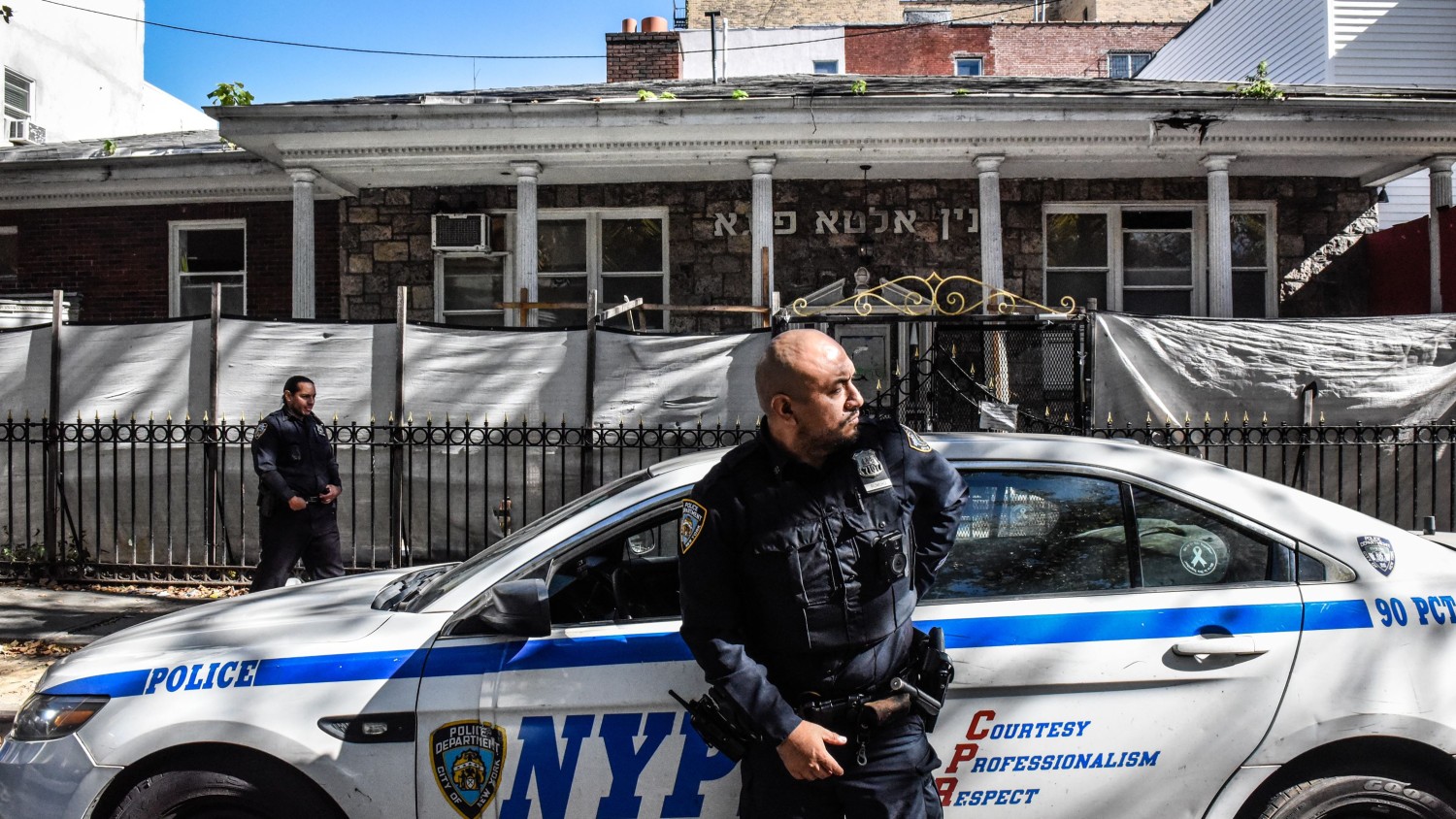 Members of the New York Police Department patrol in front of a synagogue on October 13, 2023 in the Williamsburg neighborhood in Brooklyn. Stephanie Keith/Getty Images