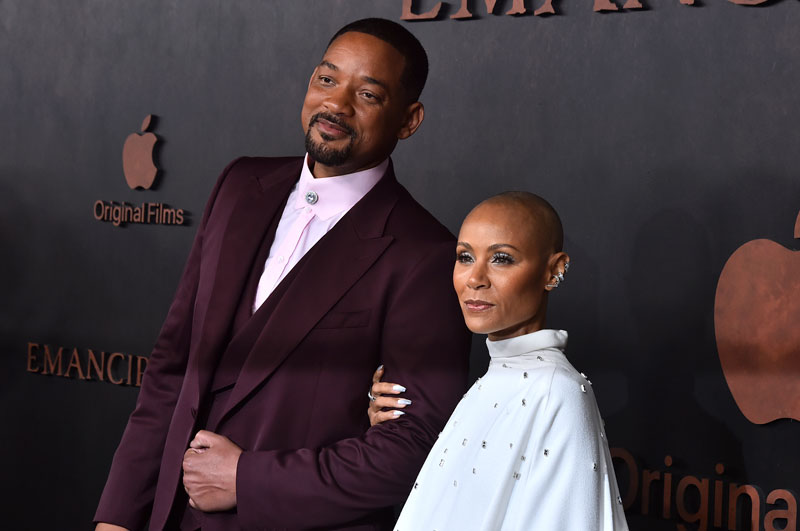 Will Smith, left, and Jada Pinkett Smith arrive at the premiere of “Emancipation,” on Nov. 30, 2022, at the Regency Village Theatre in Los Angeles.Jordan Strauss—Invision/AP