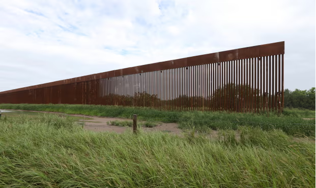 The decision to contrasts with Biden administration’s previous statement that ‘building a massive wall that spans the entire southern border is not a serious policy solution.’ Photograph: Delcia Lopez/AP