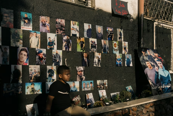 Images of martyrs are displayed on the walls of a refugee camp in Jenin in July. (Lorenzo Tugnoli for The Washington Post)