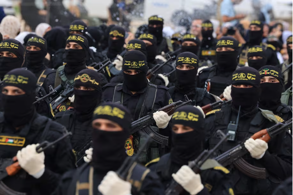 Palestinian militants of the Islamic Jihad movement participate in an anti-Israel military parade marking the 36th anniversary of the group's foundation in Gaza City Oct. 4. (Mahmud Hams/AFP/Getty Images)