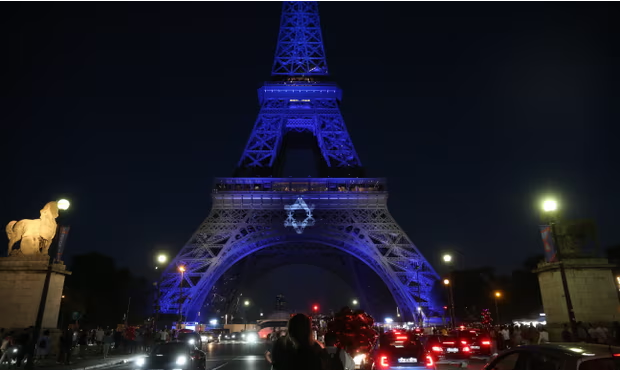 The Eiffel Tower is lit with the Star of David in support of Israel following the Hamas attack. Photograph: Michel Stoupak/NurPhoto/Shutterstock