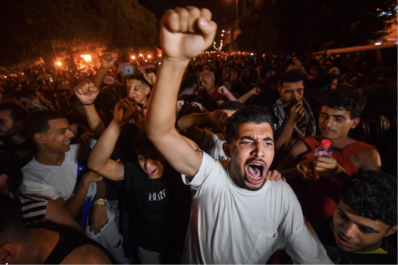 Tunisian protesters shout slogans during an anti-Israel demonstration in front of the French Embassy in Tunis on Tuesday. (Fethi Belaid/AFP/Getty Images)