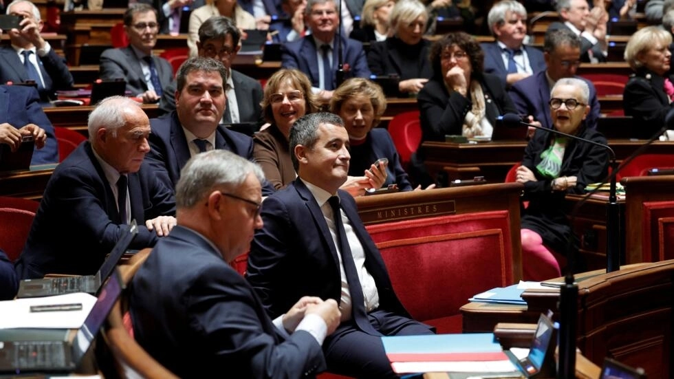 French Interior Minister Gerald Darmanin reacts as the French Senate president announces the vote on an immigration bill at the French Senate in Paris on November 14, 2023. © Geoffroy van der Hasselt, AFP