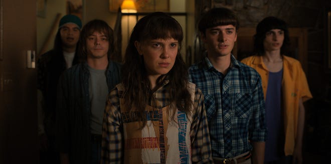 Argyle - Eduardo Franco, Jonathan Byers -Charlie Heaton, Eleven -Millie Bobby Brown, Will Byers - Noah Schnapp and Mike Wheeler -Finn Wolfhard - in this screenshot from the fourth season of Netflix sci-fi hit Stranger Things