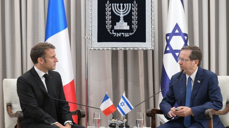 FILE PHOTO: French President Emmanuel Macron meets Israeli President Isaac Herzog in Jerusalem on October 24, 2023. ©  GPO - Handout / Anadolu via Getty Images