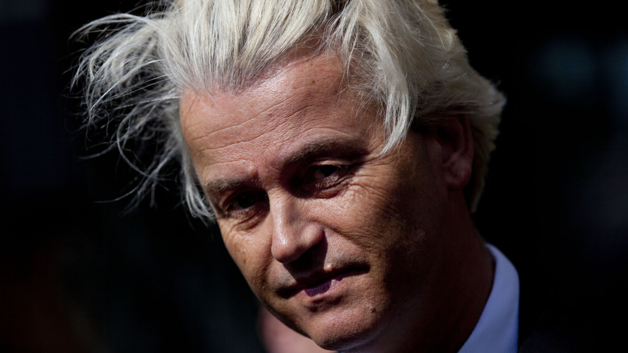 FILE PHOTO: Geert Wilders speaks to journalists outside the Dutch National Bank in Amsterdam, The Netherlands, May 12, 2014