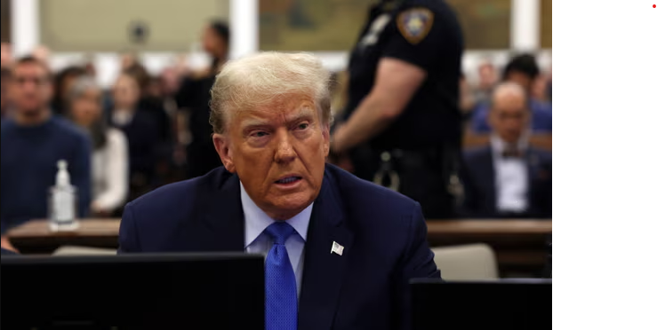 Donald Trump waits to take the witness stand during his civil fraud trial at the state supreme court Monday in New York, New York. Photograph: Brendan McDermid/AP