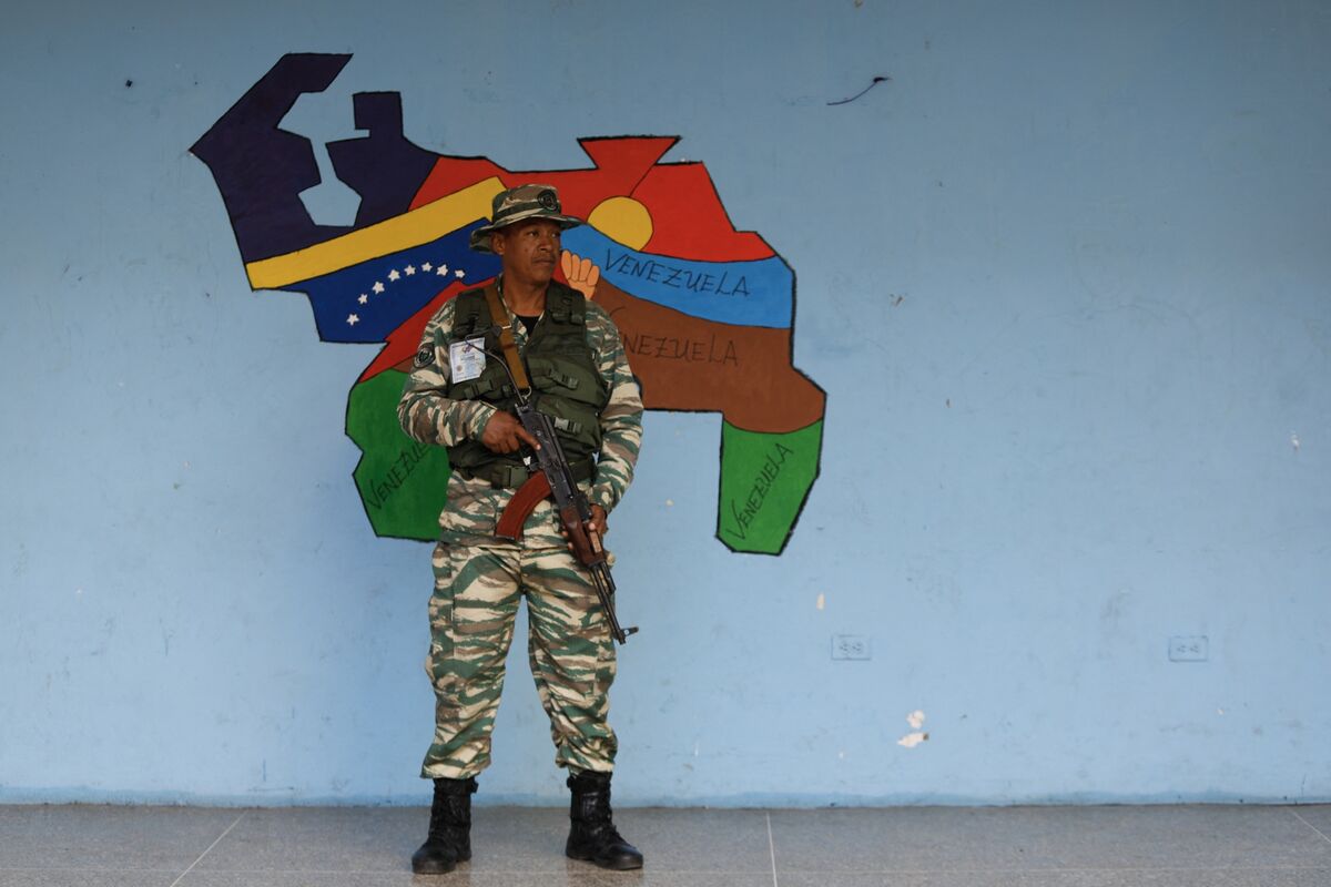 A voting station in Venezuela can be an intimidating place.Photographer: Pedro Rances  Mattey/AFP/Getty Images