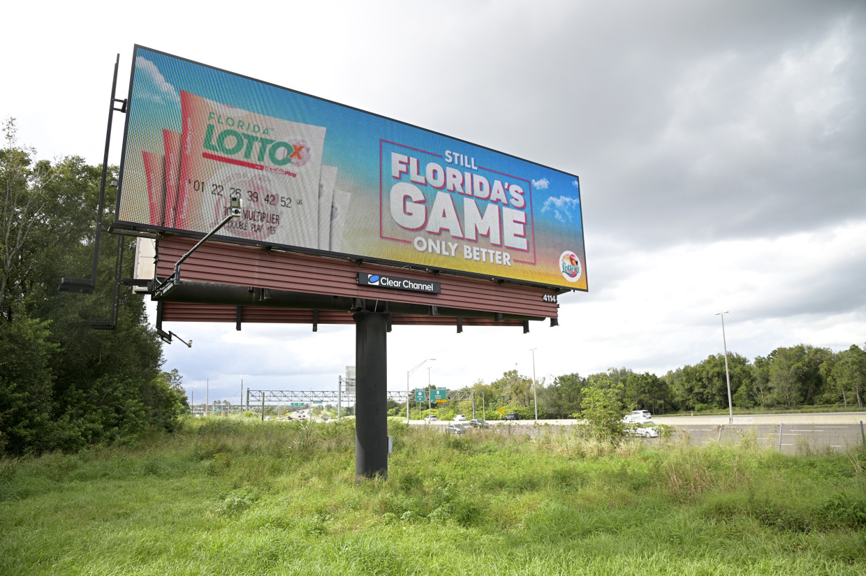 An ad for the Florida Lottery on a billboard along the Florida Turnpike in Ocoee, Fla., on Oct. 27, 2020. Phelan M. Ebenhack via AP file