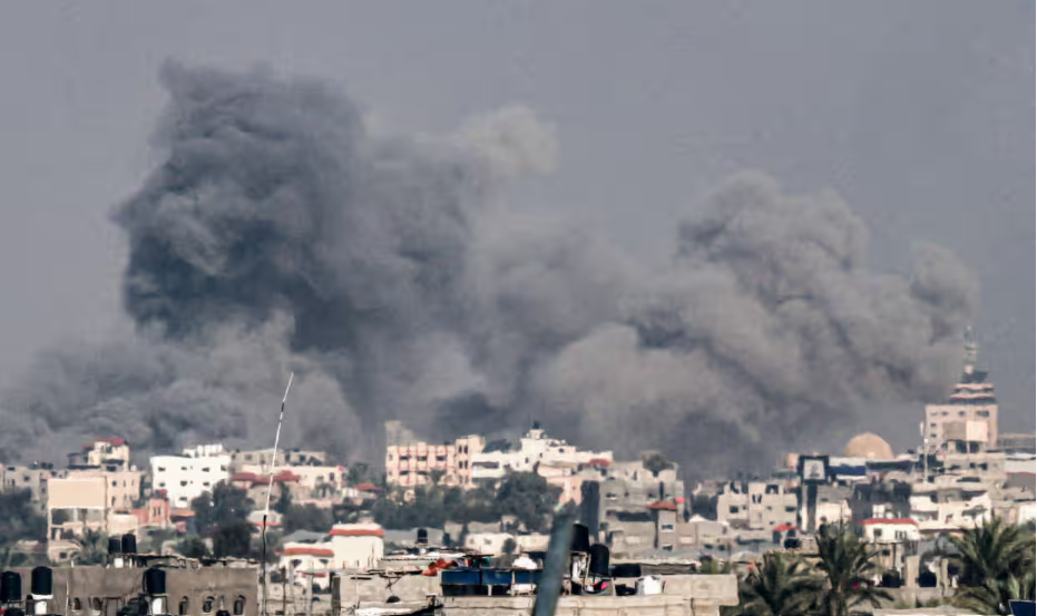 Smoke billowing from Gaza’s second largest city, Khan Younis, which is the latest target of Israel’s offensive. Photograph: Said Khatib/AFP/Getty Images