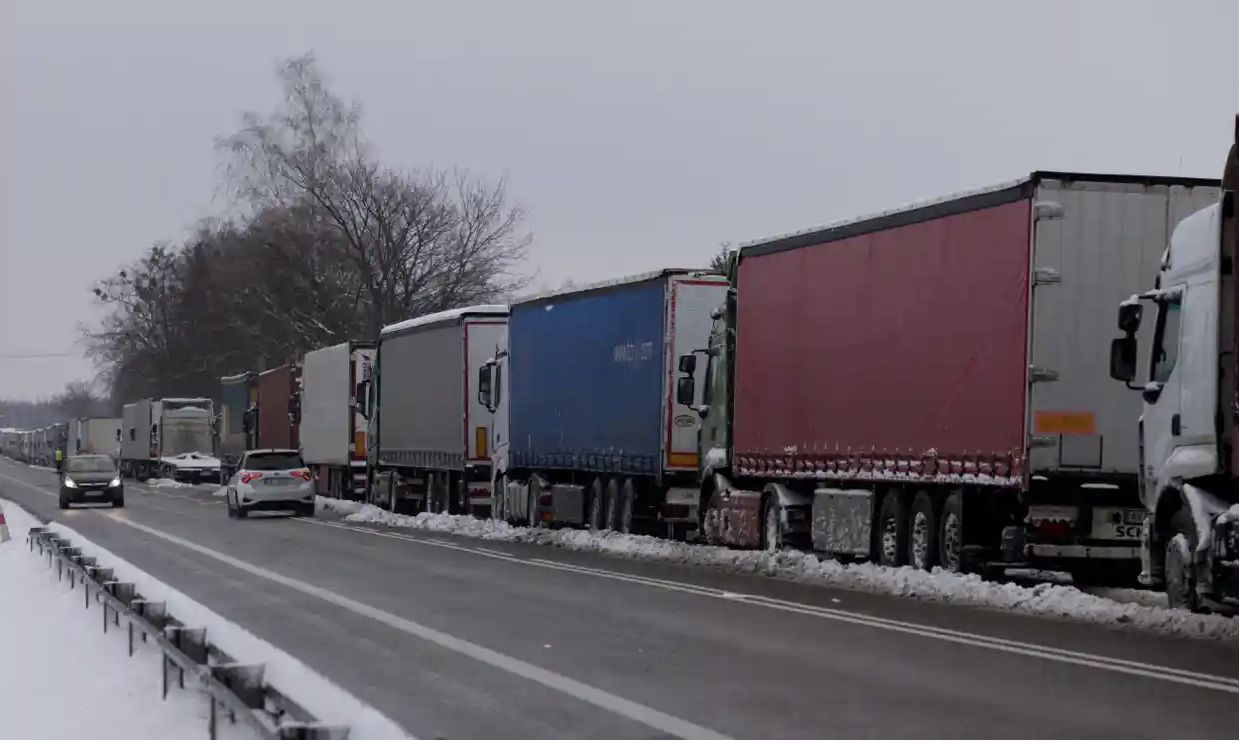 Trucks lining up to cross the Polish-Ukrainian border at the Dorohusk-Jagodzin crossing, in Okopy, Poland earlier this month. Photograph: Kuba Stężycki/Reuters