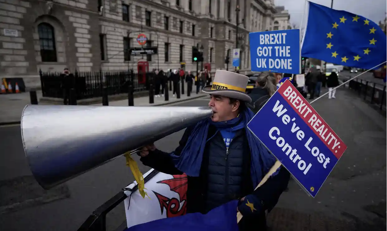 An anti-Brexit protester demonstrates on the edge of Parliament Square, close to the House of Commons, in 2021. Photograph: Matt Dunham/AP