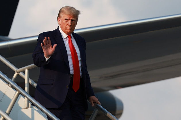 Donald Trump isn't required to attend his appeals court argument on Tuesday, but he plans to do so anyway — the latest sign that he's using his legal troubles to juice his campaign. | Joe Raedle/Getty Images