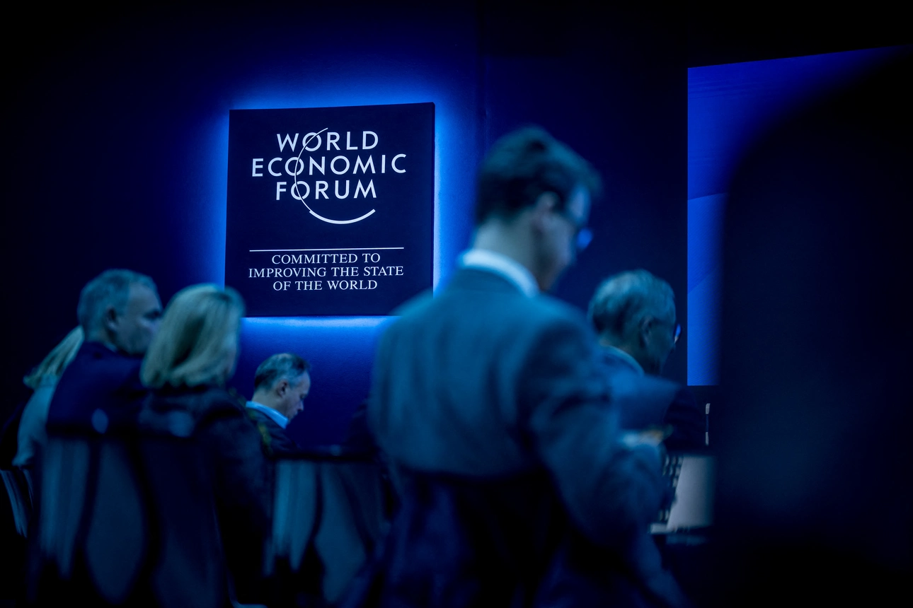 Participants wait for a session at the World Economic Forum annual meeting in Davos on Jan. 16. | Fabrice Coffrini/AFP via Getty Images