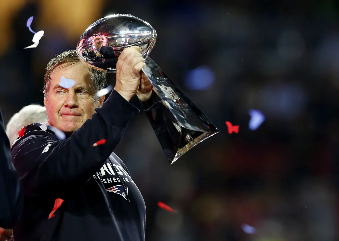 Belichick holds the Vince Lombardi Trophy after defeating the Seattle Seahawks 28-24 during Super Bowl XLIX.