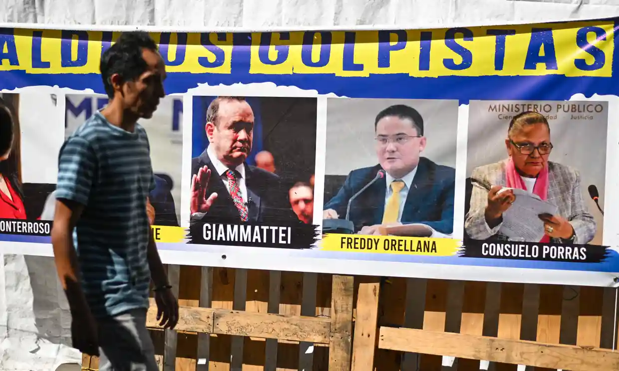 A man is seen during a demonstration calling on the attorney general, Consuelo Porras, and others to resign in Guatemala City on Tuesday. Photograph: Johan Ordóñez/AFP/Getty Images