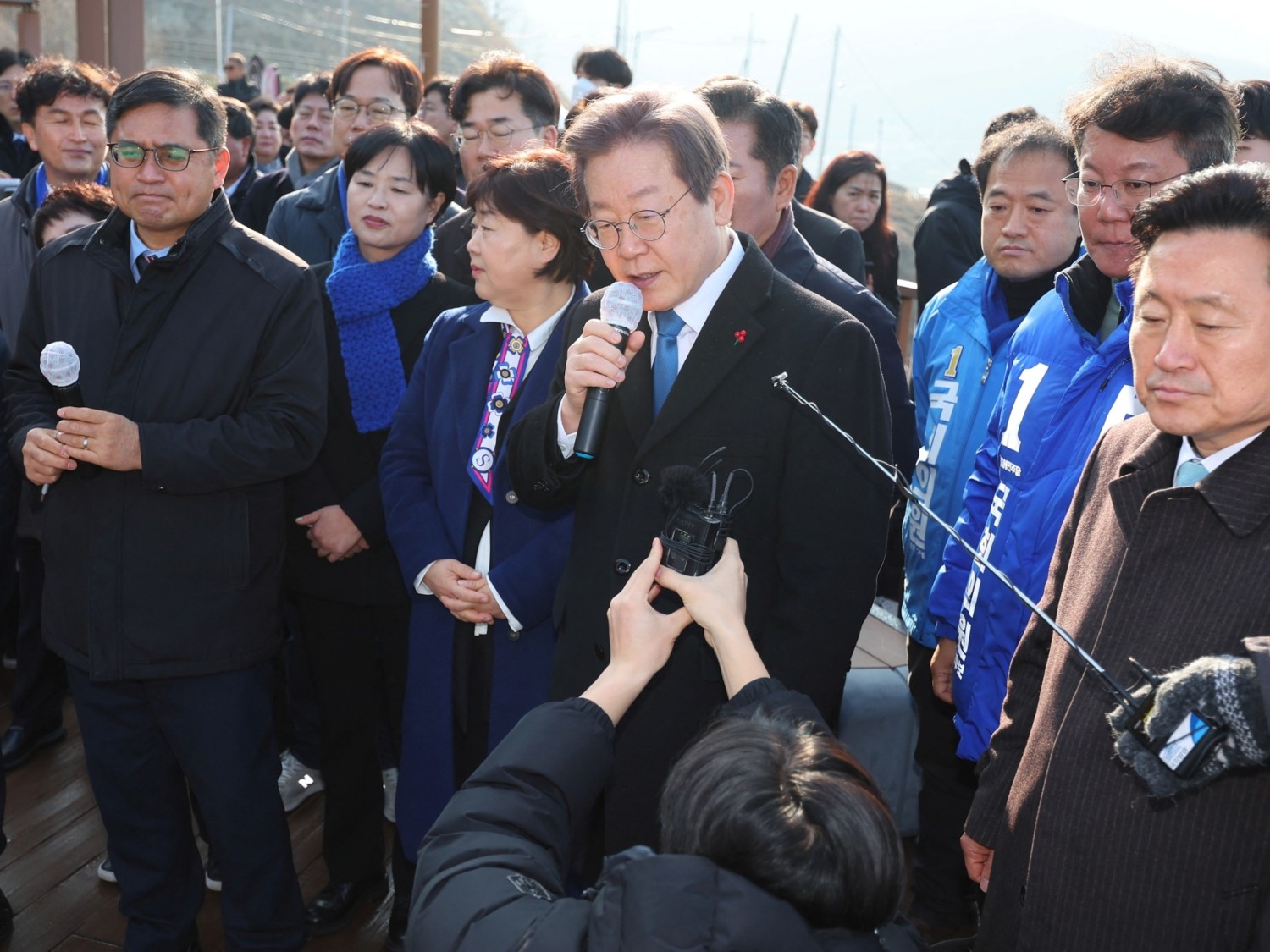 South Korea's opposition party leader Lee Jae-myung speaks during his visit to Busan, South Korea, Jan. 2, 2024. Yonhap/via Reuters