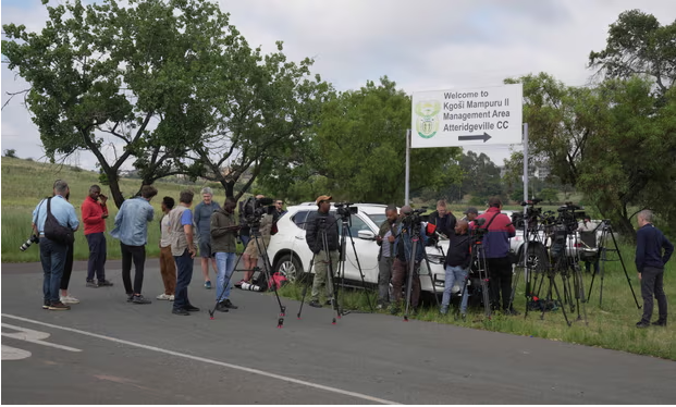 Television crews, photographers and reporters gathered outside the gates of the Atteridgeville correctional centre in Pretoria on Friday. Photograph: Tsvangirayi Pistorius/AP