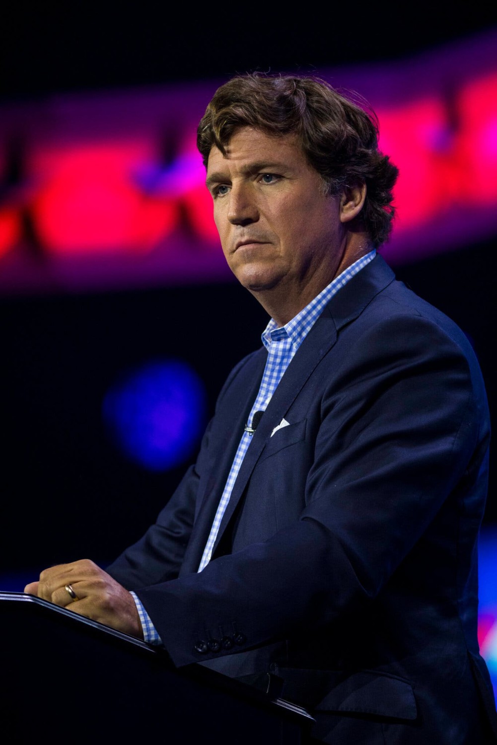 Tucker Carlson’s commentaries have often been featured on Russian state television.Credit...Saul Martinez for The New York Times