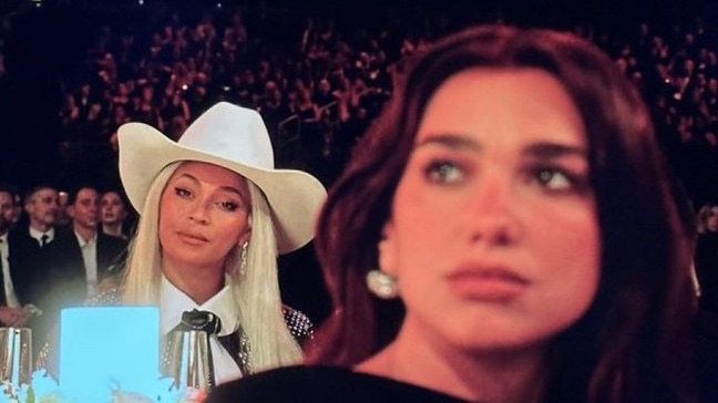 Beyonce and Dua Lipa watch Mitchell perform.