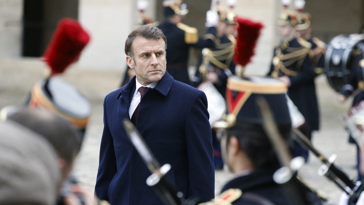 FILE PHOTO: French President Emmanuel Macron reviews troops. ©  Ludovic MARIN / POOL via AFP