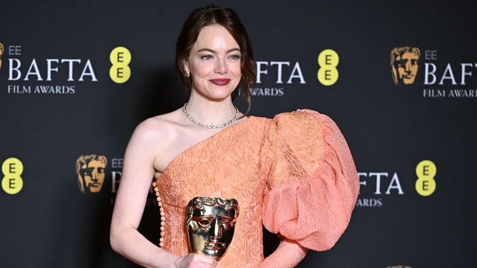 Emma Stone's dress was reminiscent of some of her costumes in Poor Things