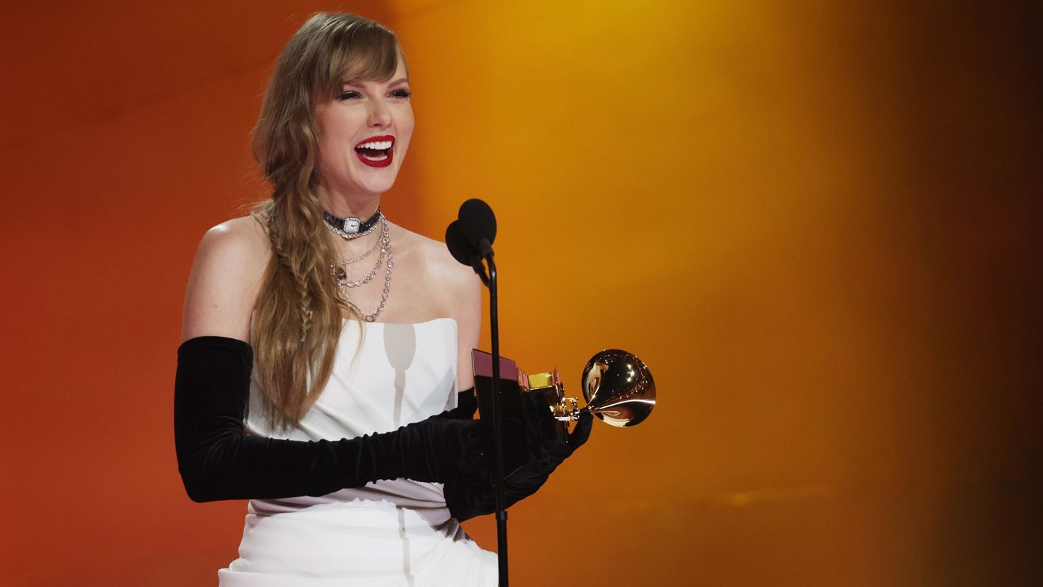 Taylor Swift accepts the best pop vocal album Grammy award "Midnights." Kevin Mazur/Getty Images
