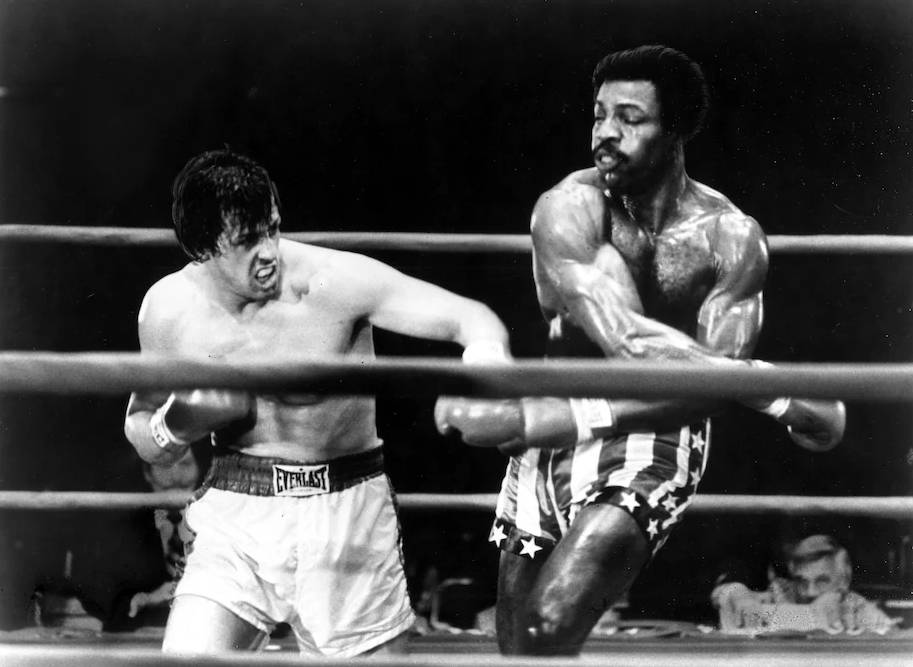 Sylvester Stallone and Carl Weathers in the 1976 film “Rocky.” (Michael Ochs Archives/Getty Images)