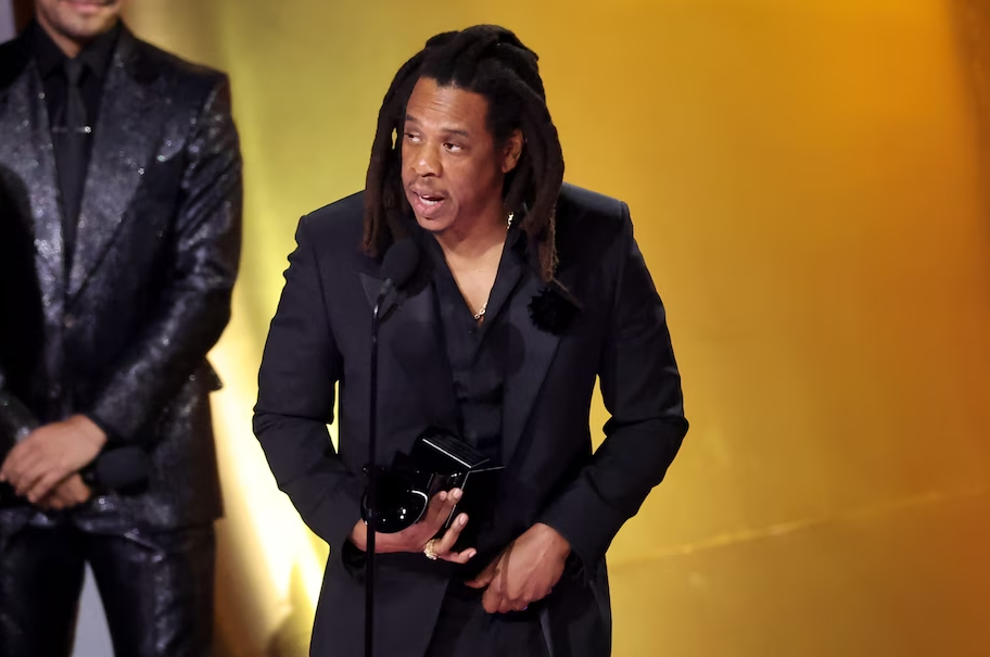 Jay-Z accepts the Dr. Dre Global Impact Award at the Grammys on Sunday in Los Angeles. (Amy Sussman/Getty Images)
