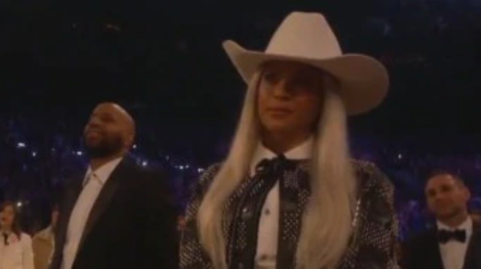 Beyonce watches her husband call out the Grammys on her behalf.