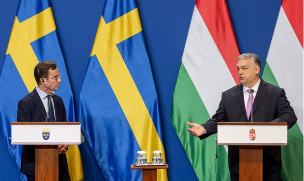 The Swedish prime minister, Ulf Kristersson (left), with the Hungarian prime minister, Viktor Orbán, in Budapest last week. Photograph: János Kummer/Getty Images