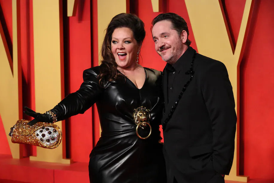 Knock, knock. Who's there? Melissa McCarthy, Ben Falcone and one very sparkly cannoli. (Danny Moloshok/Reuters)